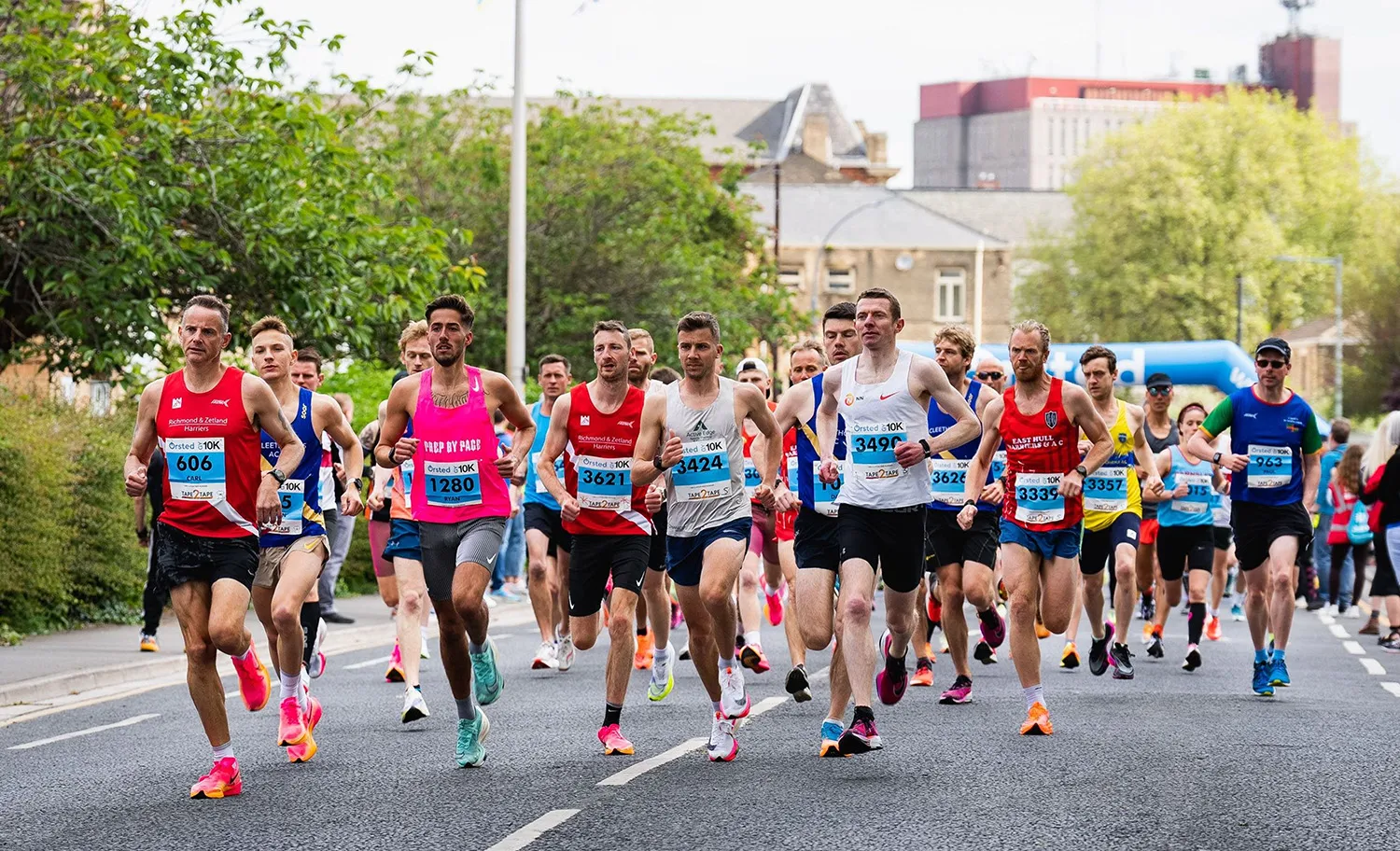 Runners at a Tape2Tape road race event